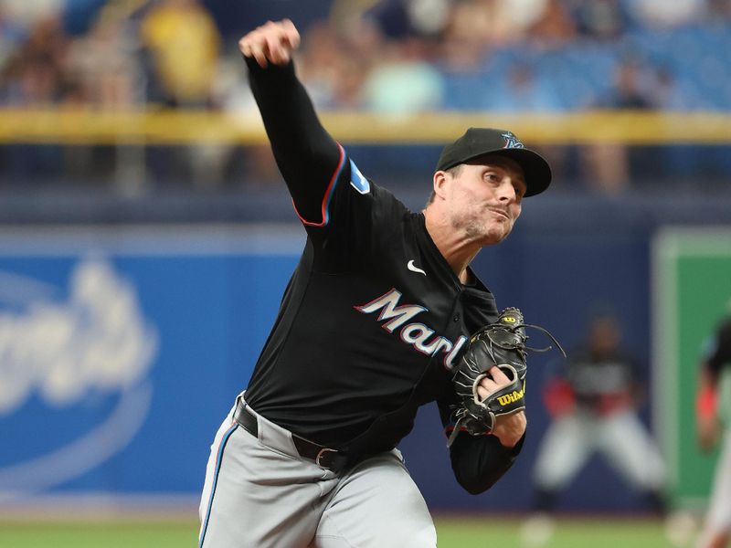 Jul 31, 2024; St. Petersburg, Florida, USA;  Miami Marlins pitcher Calvin Faucher (53) throws against the Tampa Bay Rays during the ninth inning at Tropicana Field. Mandatory Credit: Kim Klement Neitzel-USA TODAY Sports