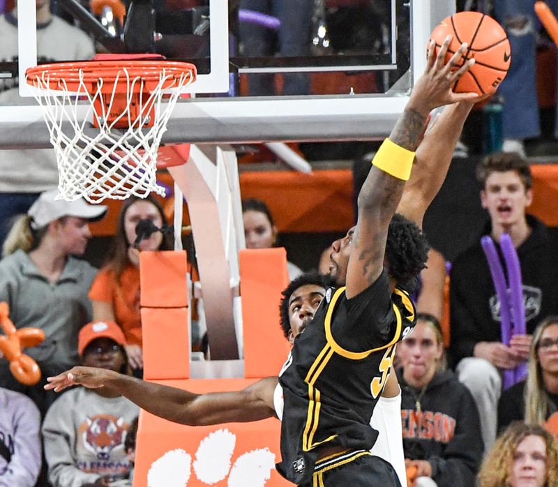 Feb 27, 2024; Clemson, South Carolina, USA;Pitt forward Zack Austin (55) dunks playing Clemson during the second half at Littlejohn Coliseum. Mandatory Credit: Ken Ruinard-USA TODAY Sports