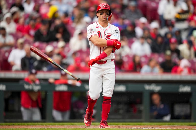May 4, 2025; Cincinnati, Ohio, USA;  Cincinnati Reds second baseman Matt McLain (9) tosses his bat as he draws a walk against the Washington Nationals in the fifth inning at Great American Ball Park. Mandatory Credit: Aaron Doster-Imagn Images