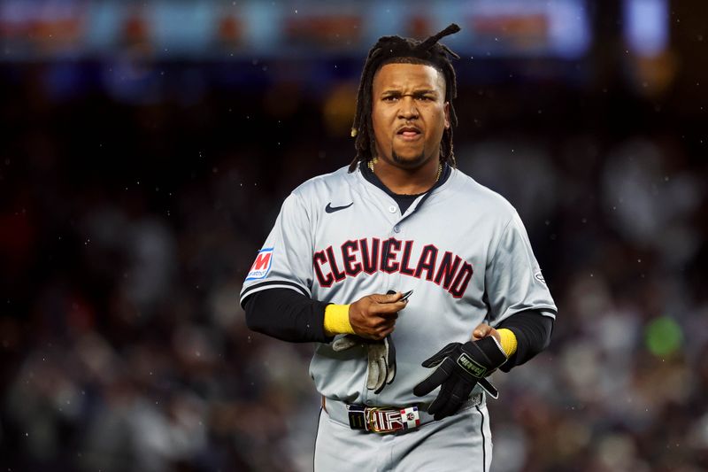 Oct 15, 2024; Bronx, New York, USA; Cleveland Guardians third base José Ramírez (11) reacts after getting out during the first inning against the New York Yankees in game two of the ALCS for the 2024 MLB Playoffs at Yankee Stadium. Mandatory Credit: Vincent Carchietta-Imagn Images