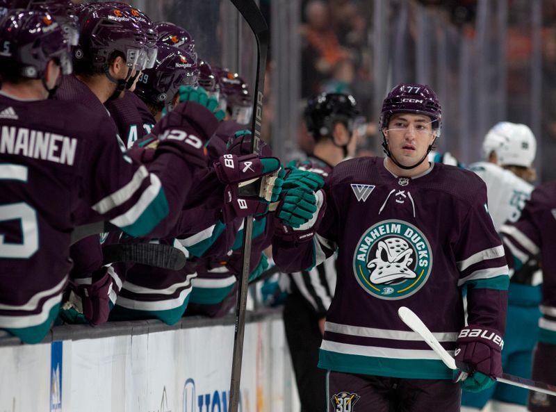 Nov 12, 2023; Anaheim, California, USA; Anaheim Ducks right wing Frank Vatrano (77) celebrates with teammates after scoring during the first period against the San Jose Sharks at Honda Center. Mandatory Credit: Jason Parkhurst-USA TODAY Sports