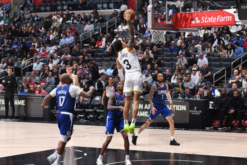 LOS ANGELES, CA - APRIL 12: Keyonte George #3 of the Utah Jazz dunks the ball during the game against the LA Clippers on April 12, 2024 at Crypto.Com Arena in Los Angeles, California. NOTE TO USER: User expressly acknowledges and agrees that, by downloading and/or using this Photograph, user is consenting to the terms and conditions of the Getty Images License Agreement. Mandatory Copyright Notice: Copyright 2024 NBAE (Photo by Adam Pantozzi/NBAE via Getty Images)