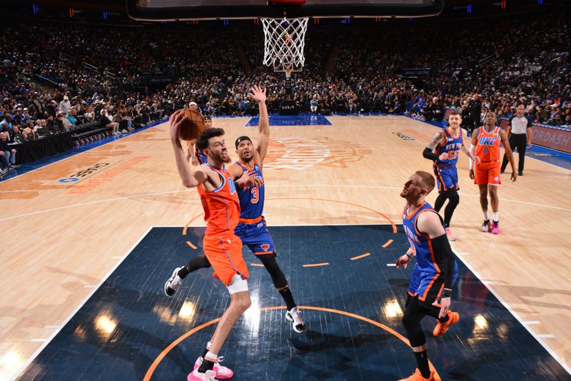 NEW YORK, NY - MARCH 31: Chet Holmgren #7 of the Oklahoma City Thunder drives to the basket during the game against the New York Knicks on March 31, 2024 at Madison Square Garden in New York City, New York.  NOTE TO USER: User expressly acknowledges and agrees that, by downloading and or using this photograph, User is consenting to the terms and conditions of the Getty Images License Agreement. Mandatory Copyright Notice: Copyright 2024 NBAE  (Photo by Jesse D. Garrabrant/NBAE via Getty Images)