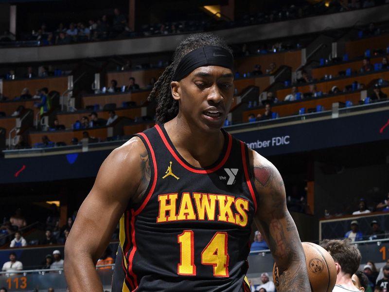 ORLANDO, FL - FEBRUARY 10: Terance Mann #14 of the Atlanta Hawks celebrates during the game against the Orlando Magic on February 10, 2025 at Kia Center in Orlando, Florida. NOTE TO USER: User expressly acknowledges and agrees that, by downloading and or using this photograph, User is consenting to the terms and conditions of the Getty Images License Agreement. Mandatory Copyright Notice: Copyright 2025 NBAE (Photo by Gary Bassing/NBAE via Getty Images)