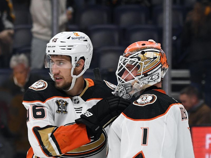 Jan 9, 2024; Nashville, Tennessee, USA; Anaheim Ducks defenseman Ilya Lyubushkin (46) celebrates with goaltender Lukas Dostal (1) after a win against the Nashville Predators at Bridgestone Arena. Mandatory Credit: Christopher Hanewinckel-USA TODAY Sports