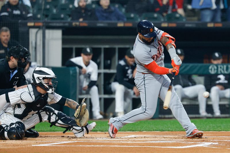 Jun 4, 2025; Chicago, Illinois, USA; Detroit Tigers second baseman Gleyber Torres (25) doubles against the Chicago White Sox during the first inning at Rate Field. Mandatory Credit: Kamil Krzaczynski-Imagn Images