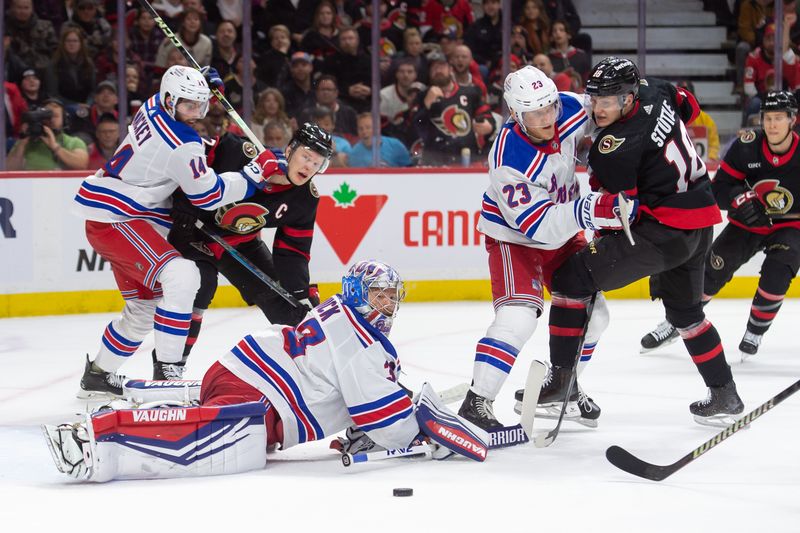 Jan 27, 2024; Ottawa, Ontario, CAN; New York Rangers goalie Jonathan Quick (32) makes a pad save in front of Ottawa Senators center Tim Stutzle (18) in the first period at the Canadian Tire Centre. Mandatory Credit: Marc DesRosiers-USA TODAY Sports