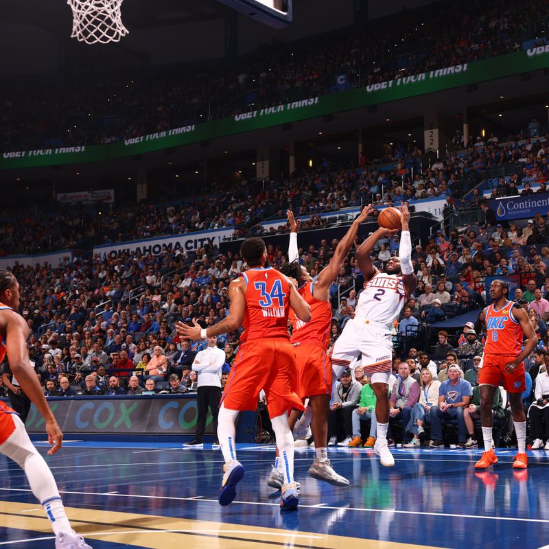 OKLAHOMA CITY, OK - NOVEMBER 15: Josh Okogie #2 of the Phoenix Suns shoots the ball during the game against the Oklahoma City Thunder during the Emirates NBA Cup game on November 15, 2024 at Paycom Center in Oklahoma City, Oklahoma. NOTE TO USER: User expressly acknowledges and agrees that, by downloading and or using this photograph, User is consenting to the terms and conditions of the Getty Images License Agreement. Mandatory Copyright Notice: Copyright 2024 NBAE (Photo by Zach Beeker/NBAE via Getty Images)