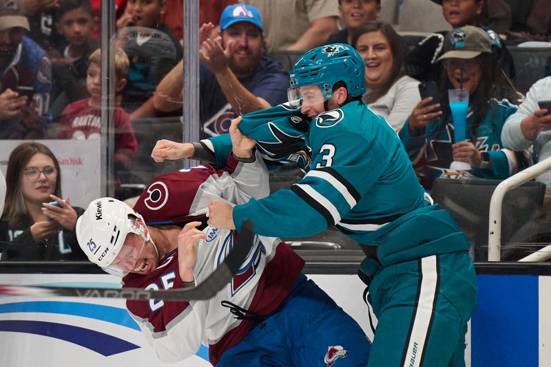 Oct 20, 2024; San Jose, California, USA; San Jose Sharks defenseman Henry Thrun (3) fights against Colorado Avalanche right wing Logan O'Connor (25) during the second period at SAP Center at San Jose. Mandatory Credit: Robert Edwards-Imagn Images