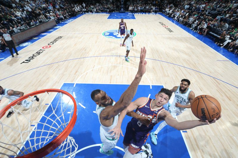 MINNEAPOLIS, MN -  APRIL 14: Grayson Allen #8 of the Phoenix Suns drives to the basket during the game against the Minnesota Timberwolves on April 14, 2024 at Target Center in Minneapolis, Minnesota. NOTE TO USER: User expressly acknowledges and agrees that, by downloading and or using this Photograph, user is consenting to the terms and conditions of the Getty Images License Agreement. Mandatory Copyright Notice: Copyright 2024 NBAE (Photo by David Sherman/NBAE via Getty Images)