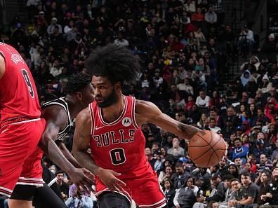 BROOKLYN, NY - NOVEMBER 26: Coby White #0 of the Chicago Bulls drives to the basket during the game against the Brooklyn Nets on November 26, 2023 at Barclays Center in Brooklyn, New York. NOTE TO USER: User expressly acknowledges and agrees that, by downloading and or using this Photograph, user is consenting to the terms and conditions of the Getty Images License Agreement. Mandatory Copyright Notice: Copyright 2023 NBAE (Photo by Jesse D. Garrabrant/NBAE via Getty Images)