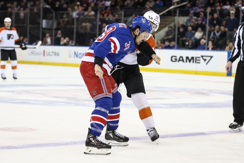 Feb 26, 2026; New York, New York, USA;  New York Rangers center Sam Carrick (39) and Philadelphia Flyers right wing Garnet Hathaway (19) fight in the first period at Madison Square Garden. Mandatory Credit: Wendell Cruz-Imagn Images