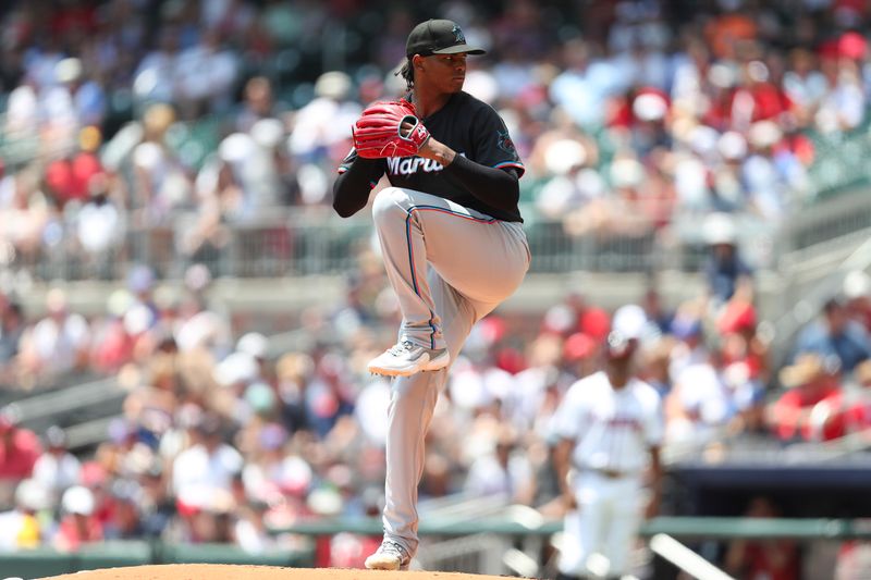 Aug 4, 2024; Cumberland, Georgia, USA; Miami Marlins starting pitcher Edward Cabrera (27) pitches against the Atlanta Braves in the first inning at Truist Park. Mandatory Credit: Mady Mertens-USA TODAY Sports