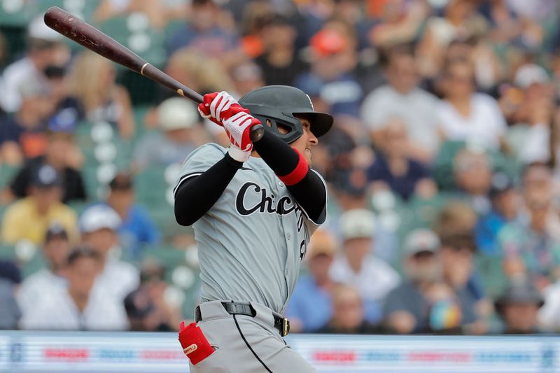 Jun 23, 2024; Detroit, Michigan, USA;  Chicago White Sox second baseman Nicky Lopez (8) hits a two hits an RBI single in the seventh inning against the Detroit Tigers at Comerica Park. Mandatory Credit: Rick Osentoski-USA TODAY Sports