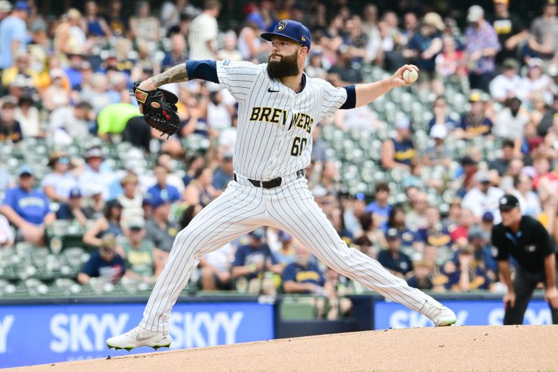 Jul 13, 2024; Milwaukee, Wisconsin, USA; Milwaukee Brewers starting pitcher Dallas Keuchel (60) pitches against the Washington Nationals in the first inning at American Family Field. Mandatory Credit: Benny Sieu-USA TODAY Sports