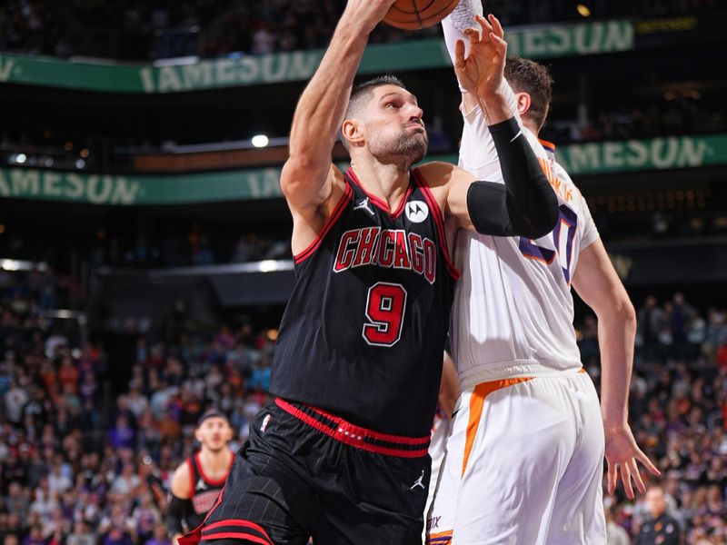 PHOENIX, AZ - JANUARY 22: Nikola Vucevic #9 of the Chicago Bulls drives to the basket during the game against the Phoenix Suns on January 22, 2024 at Footprint Center in Phoenix, Arizona. NOTE TO USER: User expressly acknowledges and agrees that, by downloading and or using this photograph, user is consenting to the terms and conditions of the Getty Images License Agreement. Mandatory Copyright Notice: Copyright 2024 NBAE (Photo by Garrett Ellwood/NBAE via Getty Images)