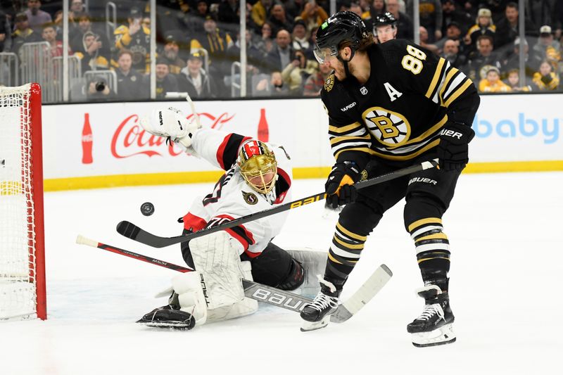 Mar 19, 2024; Boston, Massachusetts, USA;  Boston Bruins right wing David Pastrnak (88) scores a goal past Ottawa Senators goaltender Joonas Korpisalo (70) during the first period at TD Garden. Mandatory Credit: Bob DeChiara-USA TODAY Sports