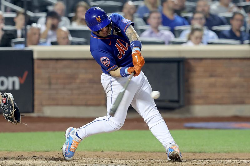 Jul 18, 2023; New York City, New York, USA; New York Mets catcher Francisco Alvarez (4) hits a two run home run against the Chicago White Sox during the sixth inning at Citi Field. Mandatory Credit: Brad Penner-USA TODAY Sports