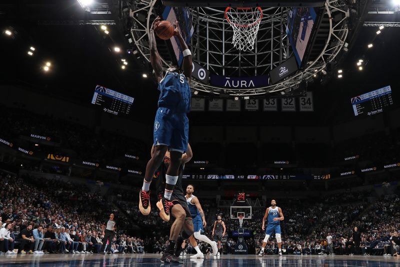 MINNEAPOLIS, MN -  APRIL 9: Anthony Edwards #5 of the Minnesota Timberwolves rebounds during the game against the Washington Wizards on April 9, 2024 at Target Center in Minneapolis, Minnesota. NOTE TO USER: User expressly acknowledges and agrees that, by downloading and or using this Photograph, user is consenting to the terms and conditions of the Getty Images License Agreement. Mandatory Copyright Notice: Copyright 2024 NBAE (Photo by Jordan Johnson/NBAE via Getty Images)