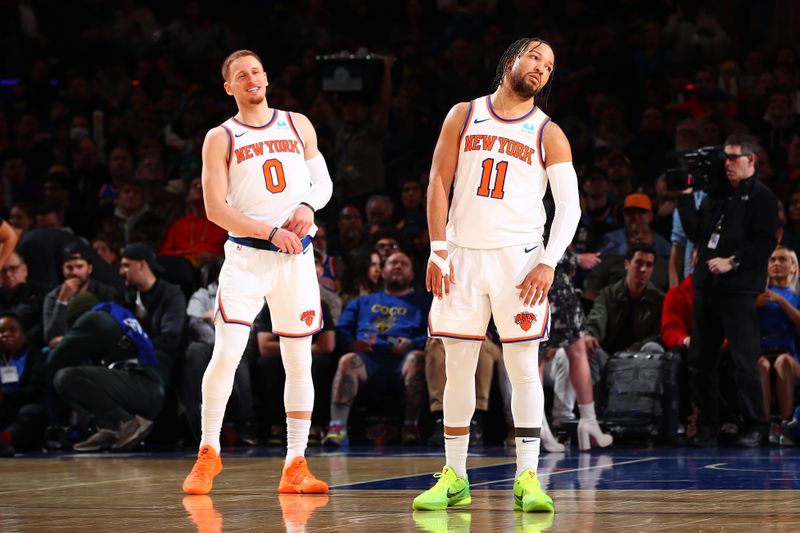 NEW YORK, NY - MARCH 25:  Donte Divincenzo #0 and Jalen Brunson #11 of the New York Knicks looks on during the game against the Detroit Pistons on March 25, 2024 at Madison Square Garden in New York City, New York.  NOTE TO USER: User expressly acknowledges and agrees that, by downloading and or using this photograph, User is consenting to the terms and conditions of the Getty Images License Agreement. Mandatory Copyright Notice: Copyright 2024 NBAE  (Photo by David L. Nemec /NBAE via Getty Images)