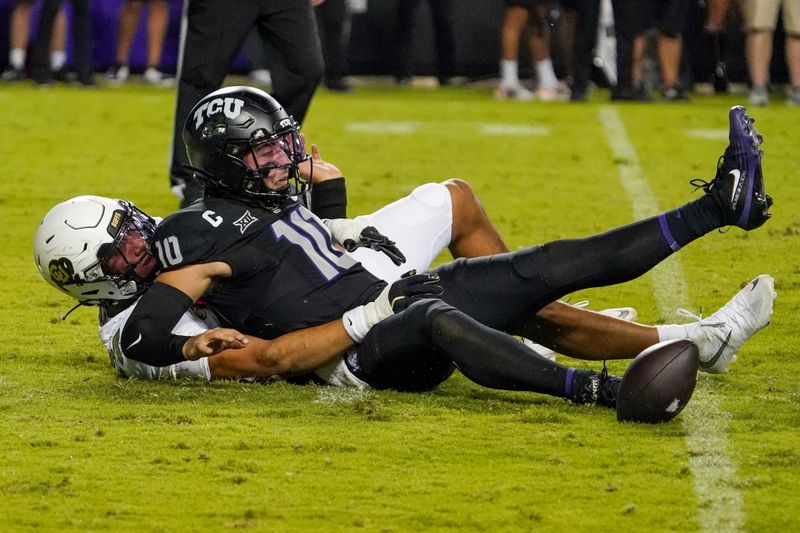 Oct 4, 2025; Fort Worth, Texas, USA; TCU Horned Frogs quarterback Josh Hoover (10) is strip sacked by Colorado Buffaloes defensive lineman Keaten Wade (27) during the first half at Amon G. Carter Stadium. Mandatory Credit: Raymond Carlin III-Imagn Images