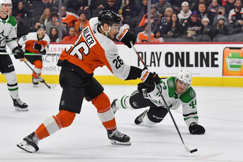 Jan 18, 2024; Philadelphia, Pennsylvania, USA; Philadelphia Flyers defenseman Sean Walker (26) scores a goal while being defended by Dallas Stars defenseman Joel Hanley (44) during the first period at Wells Fargo Center. Mandatory Credit: Eric Hartline-USA TODAY Sports