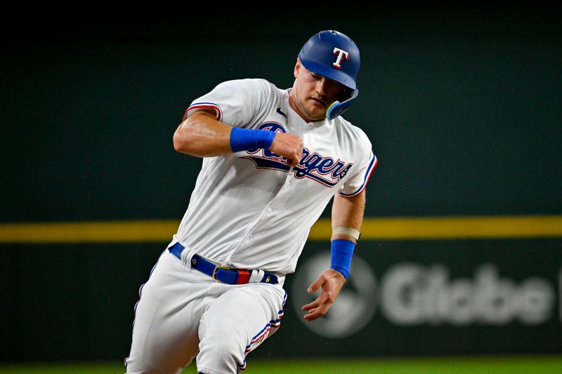 Aug 3, 2023; Arlington, Texas, USA; Texas Rangers third baseman Josh Jung (6) runs to third base during the second inning against the Chicago White Sox at Globe Life Field. Mandatory Credit: Jerome Miron-USA TODAY Sports