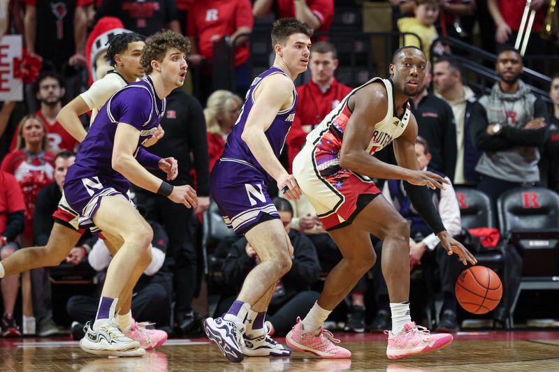 Feb 15, 2024; Piscataway, New Jersey, USA; Rutgers Scarlet Knights forward Aundre Hyatt (5) dribbles in front of Northwestern Wildcats guard Brooks Barnhizer (13) and forward Nick Martinelli (2) during the first half at Jersey Mike's Arena. Mandatory Credit: Vincent Carchietta-USA TODAY Sports