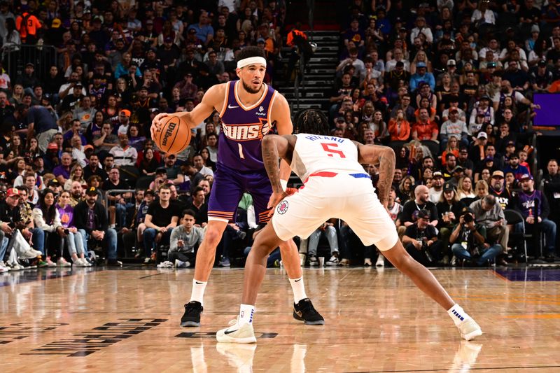 PHOENIX, AZ - APRIL  9:  Devin Booker #1 of the Phoenix Suns handles the ball during the game against the LA Clippers on April 9, 2024 at Footprint Center in Phoenix, Arizona. NOTE TO USER: User expressly acknowledges and agrees that, by downloading and or using this photograph, user is consenting to the terms and conditions of the Getty Images License Agreement. Mandatory Copyright Notice: Copyright 2024 NBAE (Photo by Kate Frese/NBAE via Getty Images)