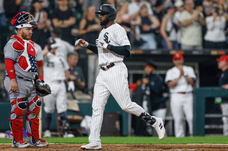 Jul 4, 2023; Chicago, Illinois, USA; Chicago White Sox center fielder Luis Robert Jr. (88) crosses home plate after hitting a three-run home run against the Toronto Blue Jays during the sixth inning at Guaranteed Rate Field. Mandatory Credit: Kamil Krzaczynski-USA TODAY Sports