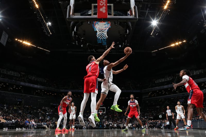 BROOKLYN, NY - OCTOBER 14: Jaylen Martin #16 of the Brooklyn Nets drives to the basket during the game against the Washington Wizards during a NBA preseason game on October 14, 2024 at Barclays Center in Brooklyn, New York. NOTE TO USER: User expressly acknowledges and agrees that, by downloading and or using this Photograph, user is consenting to the terms and conditions of the Getty Images License Agreement. Mandatory Copyright Notice: Copyright 2024 NBAE (Photo by Nathaniel S. Butler/NBAE via Getty Images)