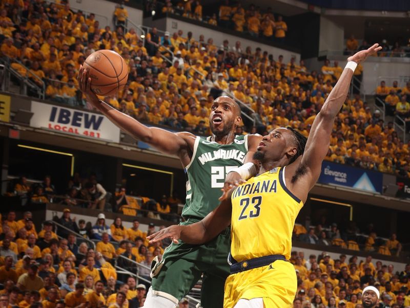 INDIANAPOLIS, IN - APRIL 26: Khris Middleton #22 of the Milwaukee Bucks drives to the basket during the game against the Indiana Pacers during Round 1 Game 3 of the 2024 NBA Playoffs on April 26, 2024 at Gainbridge Fieldhouse in Indianapolis, Indiana. NOTE TO USER: User expressly acknowledges and agrees that, by downloading and or using this Photograph, user is consenting to the terms and conditions of the Getty Images License Agreement. Mandatory Copyright Notice: Copyright 2023 NBAE (Photo by Nathaniel S. Butler/NBAE via Getty Images)