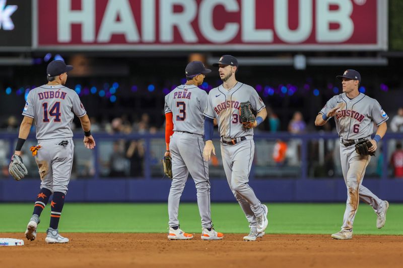 Aug 15, 2023; Miami, Florida, USA; Houston Astros right fielder Kyle Tucker (30) and center fielder Jake Meyers (6) celebrate with second baseman Mauricio Dubon (14) and shortstop Jeremy Pena (3) after defeating the Miami Marlins at loanDepot Park. Mandatory Credit: Sam Navarro-USA TODAY Sports