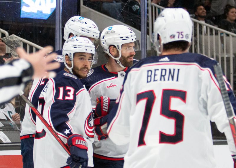 Mar 14, 2023; San Jose, California, USA; Columbus Blue Jackets left winger Johnny Gaudreau (13) is congratulated by teammates on his goal against the San Jose Sharks during the first period at SAP Center at San Jose. Mandatory Credit: D. Ross Cameron-USA TODAY Sports