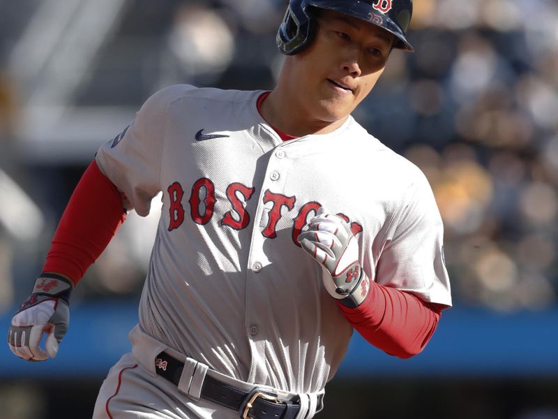 Apr 20, 2024; Pittsburgh, Pennsylvania, USA; Boston Red Sox designated hitter Masataka Yoshida (7) circles the bases after hitting a two run home against Pittsburgh Pirates at PNC Park. Mandatory Credit: Charles LeClaire-USA TODAY Sports