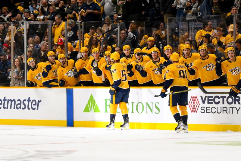 Nashville Predators defenseman Roman Josi (59) celebrates his goal with his teammates  against the Colorado Avalanche Nov 2, 2024; Nashville, Tennessee, USA;  during the third period at Bridgestone Arena. Mandatory Credit: Steve Roberts-Imagn Images