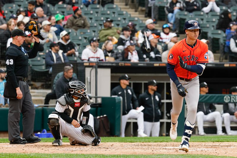 May 4, 2025; Chicago, Illinois, USA; Houston Astros right fielder Zach Dezenzo (9) runs after hitting a two-run home run against the Chicago White Sox during the fifth inning at Rate Field. Mandatory Credit: Kamil Krzaczynski-Imagn Images