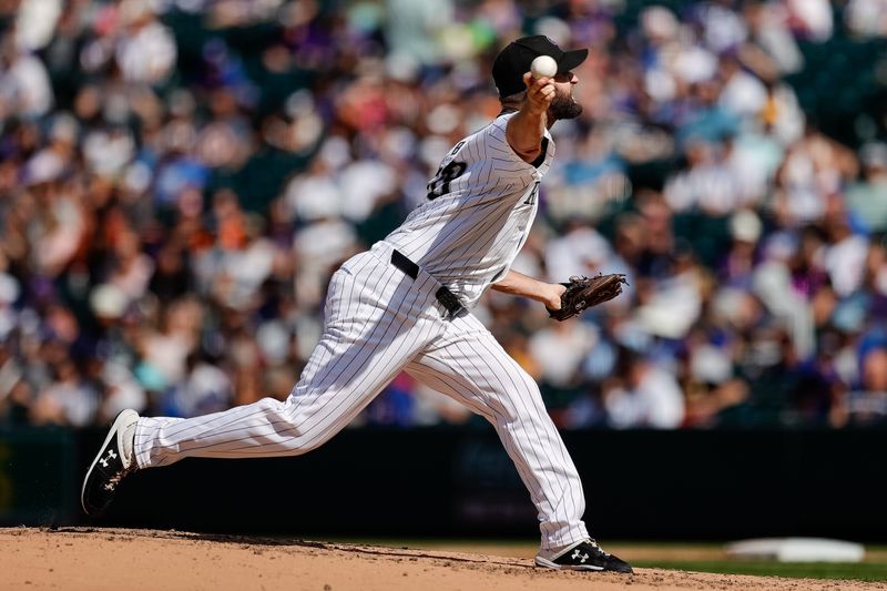 Sep 15, 2024; Denver, Colorado, USA; Colorado Rockies relief pitcher Jake Bird (59) pitches in the sixth inning against the Chicago Cubs at Coors Field. Mandatory Credit: Isaiah J. Downing-Imagn Images