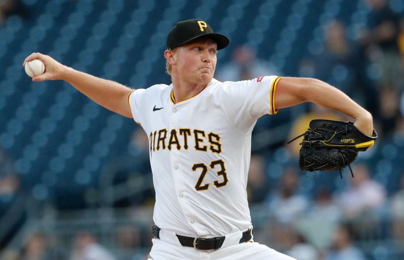 Jul 2, 2024; Pittsburgh, Pennsylvania, USA;  Pittsburgh Pirates starting pitcher Mitch Keller (23) delivers a pitch against the St. Louis Cardinals during the first inning at PNC Park. Mandatory Credit: Charles LeClaire-USA TODAY Sports