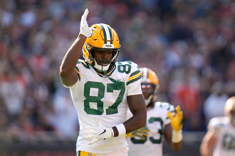 Green Bay Packers wide receiver Romeo Doubs celebrates his touchdown reception from quarterback Jordan Love during the first half of an NFL football game against the Chicago Bears Sunday, Sept. 10, 2023, in Chicago. (AP Photo/Erin Hooley)