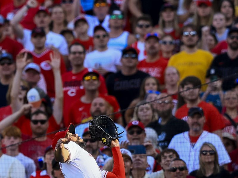 May 27, 2024; Cincinnati, Ohio, USA; Cincinnati Reds first baseman Jeimer Candelario (3) catches a pop up hit by St. Louis Cardinals third baseman Nolan Arenado (not pictured) in the ninth inning at Great American Ball Park. Mandatory Credit: Katie Stratman-USA TODAY Sports