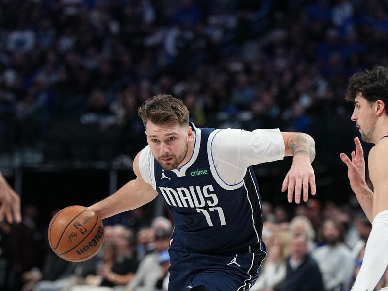 DALLAS, TX - FEBRUARY 12: Luka Doncic #77 of the Dallas Mavericks handles the ball during the game against the Washington Wizards on February 12, 2024 at the American Airlines Center in Dallas, Texas. NOTE TO USER: User expressly acknowledges and agrees that, by downloading and or using this photograph, User is consenting to the terms and conditions of the Getty Images License Agreement. Mandatory Copyright Notice: Copyright 2024 NBAE (Photo by Glenn James/NBAE via Getty Images)