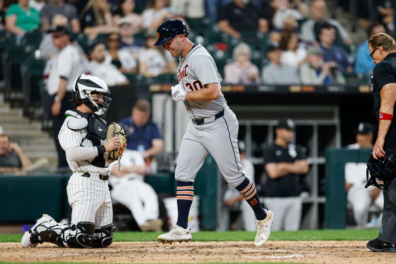 Jun 2, 2025; Chicago, Illinois, USA; Detroit Tigers designated hitter Kerry Carpenter (30) crosses home plate after hitting a solo home run against the Chicago White Sox during the sixth inning at Rate Field. Mandatory Credit: Kamil Krzaczynski-Imagn Images
