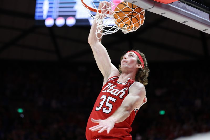 Dec 9, 2023; Salt Lake City, Utah, USA; Utah Utes center Branden Carlson (35) dunks the ball against the Brigham Young Cougars during the second half at Jon M. Huntsman Center. Mandatory Credit: Rob Gray-USA TODAY Sports