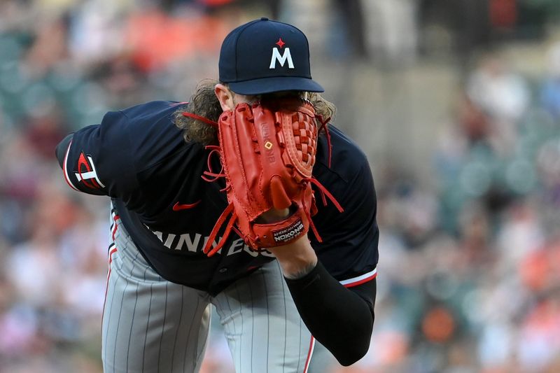 Apr 16, 2024; Baltimore, Maryland, USA;  Minnesota Twins pitcher Chris Paddack (20) looks towards home plate during the second inning against the Baltimore Orioles at Oriole Park at Camden Yards. Mandatory Credit: Tommy Gilligan-USA TODAY Sports