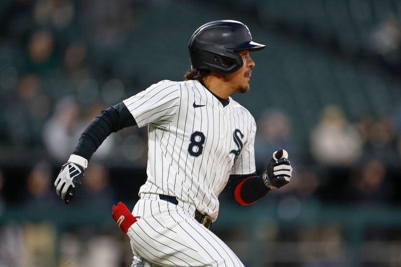 Apr 26, 2024; Chicago, Illinois, USA; Chicago White Sox second baseman Nicky Lopez (8) runs to second base after hitting a ground-rule double against the Tampa Bay Rays during the fourth inning at Guaranteed Rate Field. Mandatory Credit: Kamil Krzaczynski-USA TODAY Sports