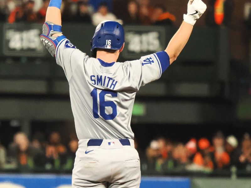 May 14, 2024; San Francisco, California, USA; Los Angeles Dodgers catcher Will Smith (16) celebrates after a double against the San Francisco Giants during the ninth inning at Oracle Park. Mandatory Credit: Kelley L Cox-USA TODAY Sports