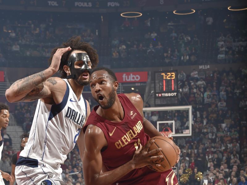 CLEVELAND, OH - FEBRUARY 27: Evan Mobley #4 of the Cleveland Cavaliers drives to the basket during the game against the Dallas Mavericks on February 27, 2024 at Rocket Mortgage FieldHouse in Cleveland, Ohio. NOTE TO USER: User expressly acknowledges and agrees that, by downloading and/or using this Photograph, user is consenting to the terms and conditions of the Getty Images License Agreement. Mandatory Copyright Notice: Copyright 2024 NBAE (Photo by David Liam Kyle/NBAE via Getty Images)