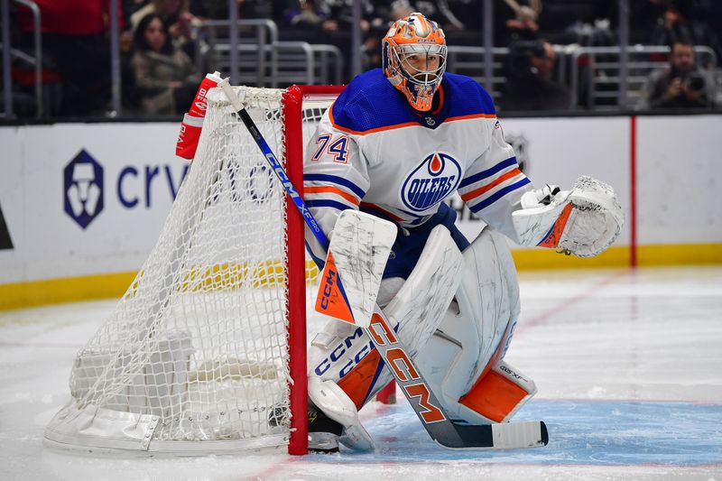 Dec 30, 2023; Los Angeles, California, USA; Edmonton Oilers goaltender Stuart Skinner (74) defends the goal against the Los Angeles Kings during the second period at Crypto.com Arena. Mandatory Credit: Gary A. Vasquez-USA TODAY Sports