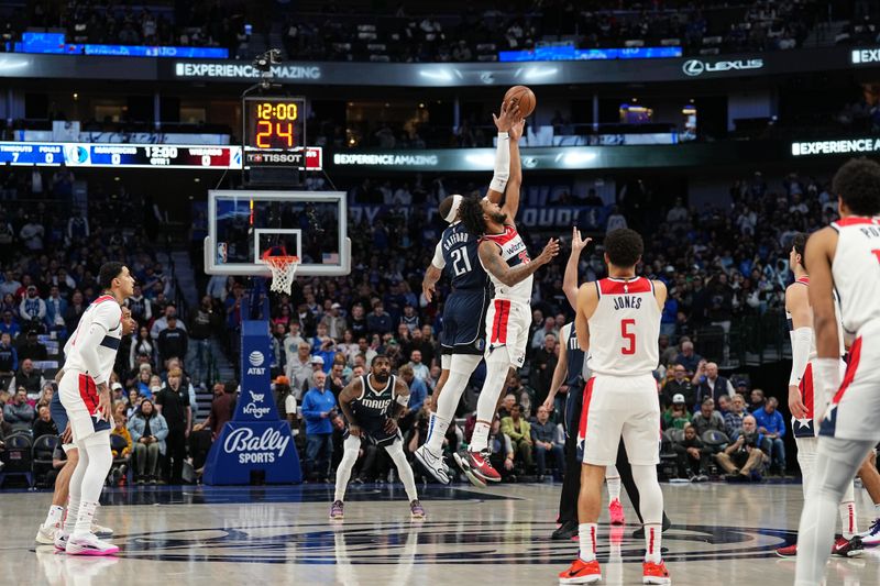 DALLAS, TX - FEBRUARY 12: Marvin Bagley III #35 of the Washington Wizards and Daniel Gafford #21 of the Dallas Mavericks go up for the opening tip off on February 12, 2024 at the American Airlines Center in Dallas, Texas. NOTE TO USER: User expressly acknowledges and agrees that, by downloading and or using this photograph, User is consenting to the terms and conditions of the Getty Images License Agreement. Mandatory Copyright Notice: Copyright 2024 NBAE (Photo by Glenn James/NBAE via Getty Images)